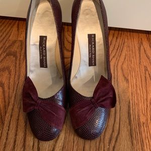 Rickard Shah red textured heels with bow detail